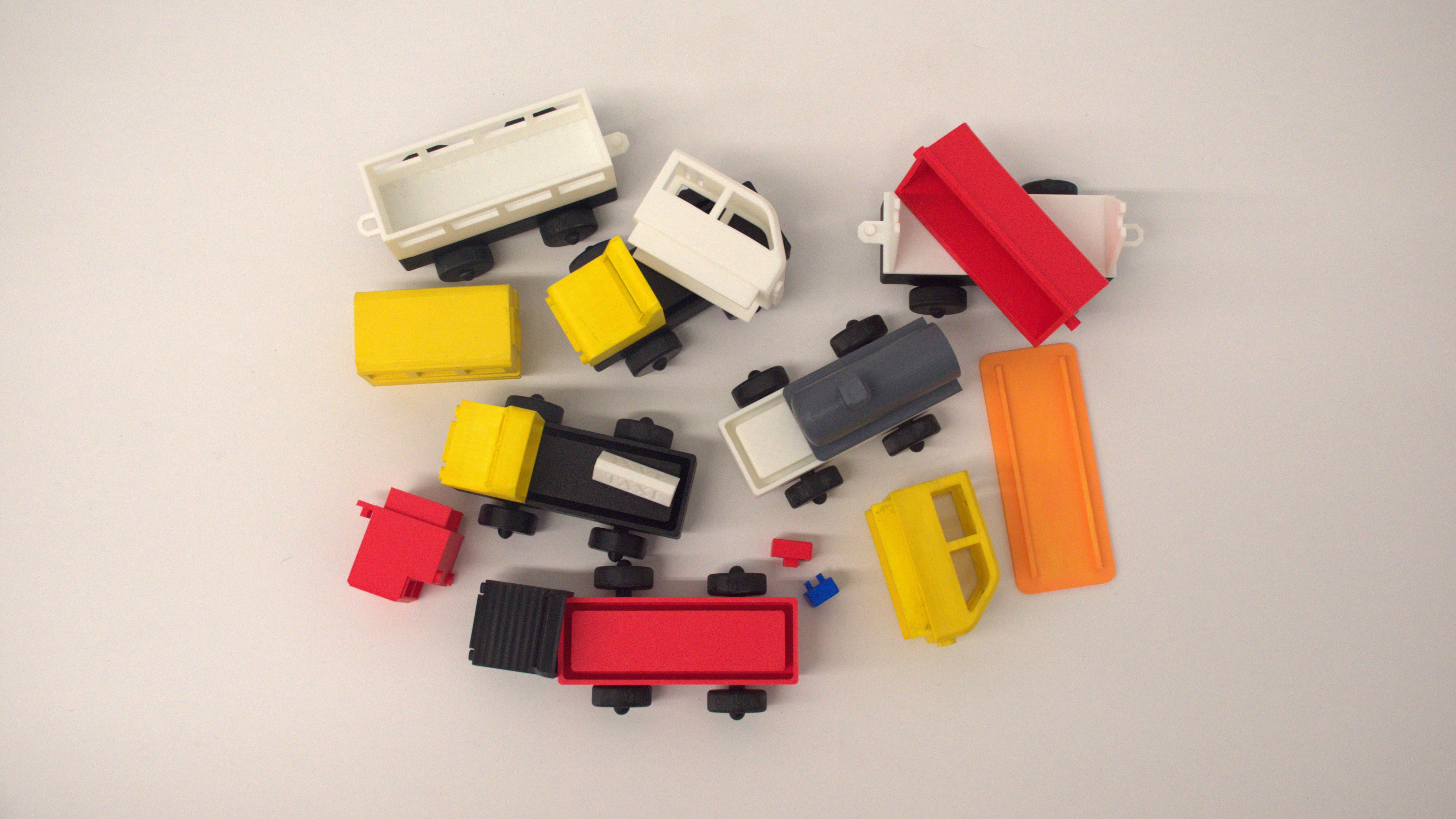 image of display of new vehicle designs taken apart, played with